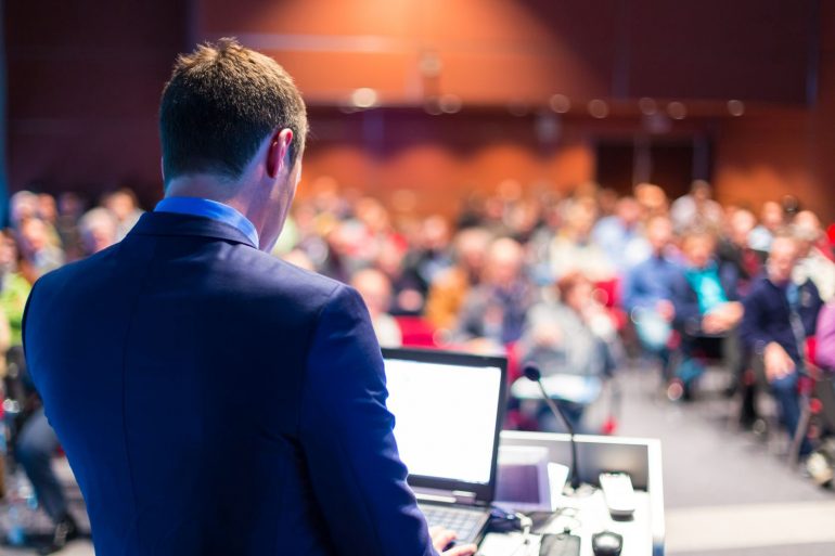 A man standing in front of a crowd