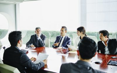 A group of people sitting at a table