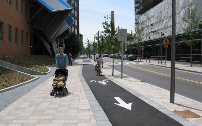 A person walking down a sidewalk
