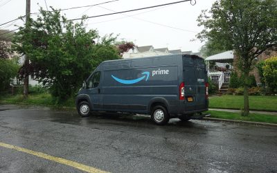 A truck is parked on the side of a road