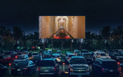 All cars are parked in front of screen